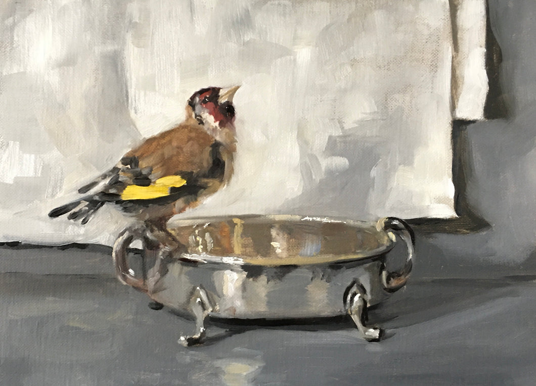 Goldfinch Perched on a Silver Dish